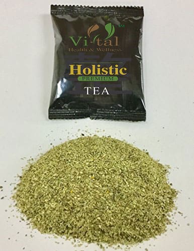 Tea package with tea ground in front of it